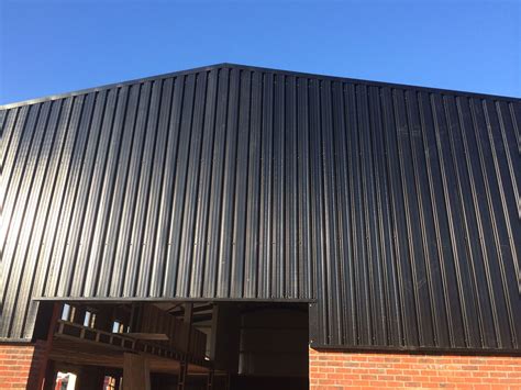 black metal cladding sheets|corrugated metal wall panels.